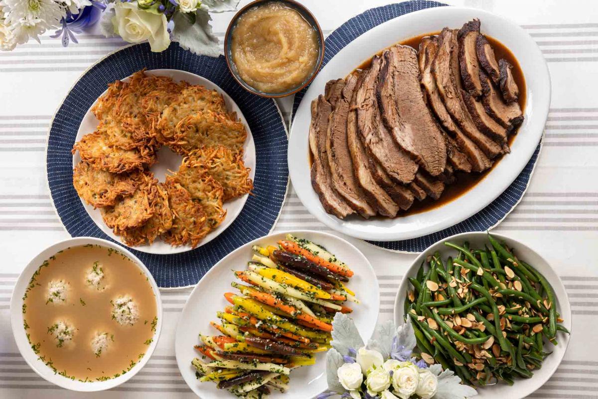 Beef brisket, matzoh ball soup, herbed carrots, potato latkes, apple sauce and green bean almondine