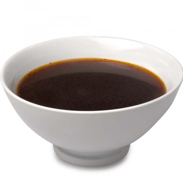 Beef jus in a serving bowl