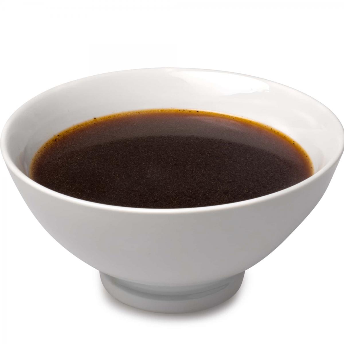 Beef jus in a serving bowl