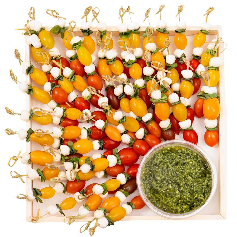 Mozzarella pearls, fresh basil and sweet cherry tomato skewers with our own basil pesto. (Vegetarian)