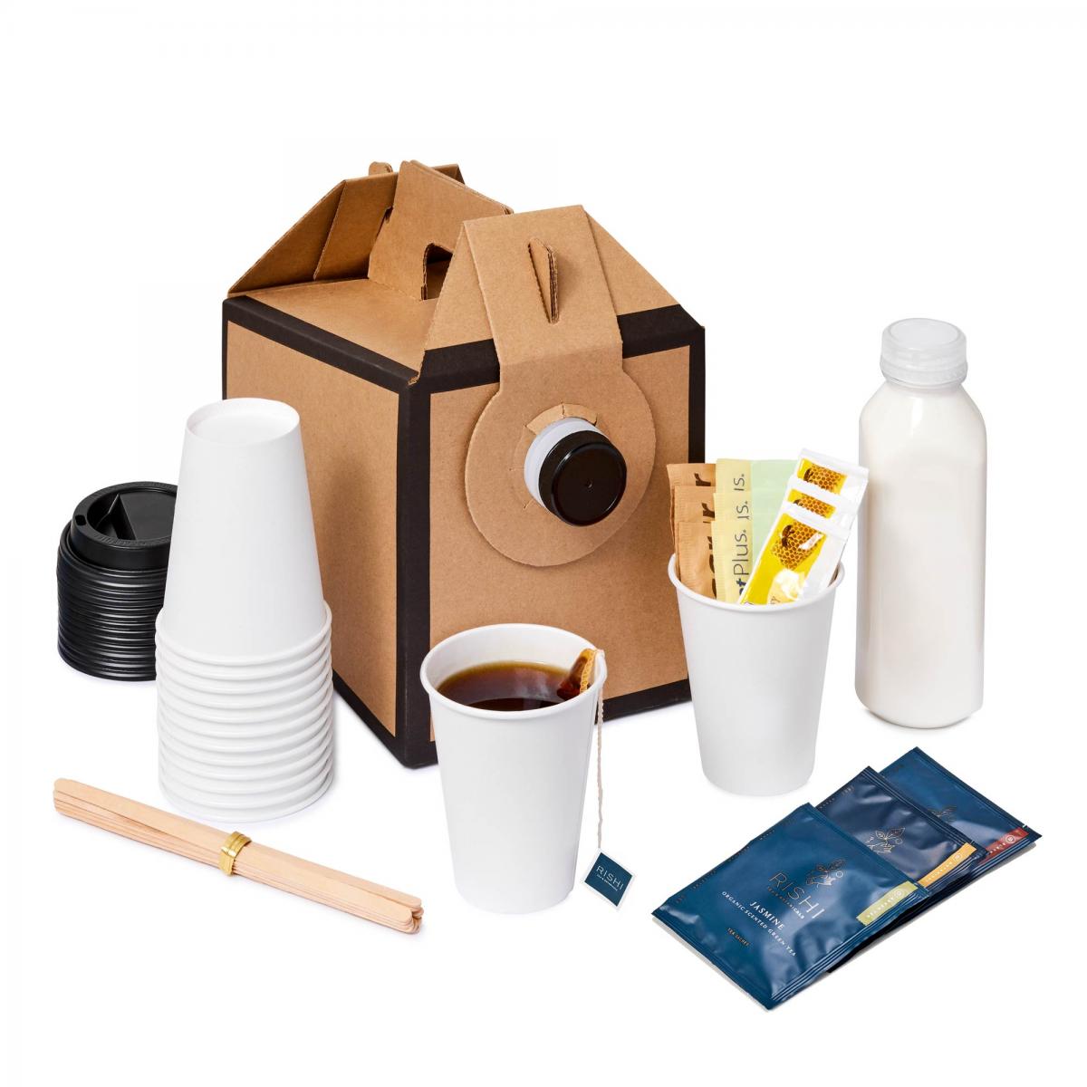 A small disposable tea dispenser with a stack of cups, lids, stir sticks, sweeteners, honey, and a bottle of cream.