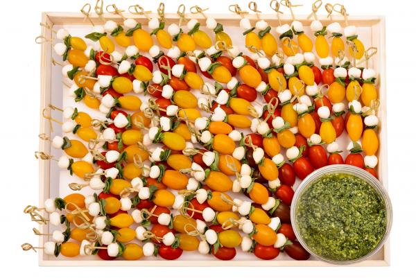 Mozzarella pearls, fresh basil and sweet cherry tomato skewers with our own basil pesto. (Vegetarian)