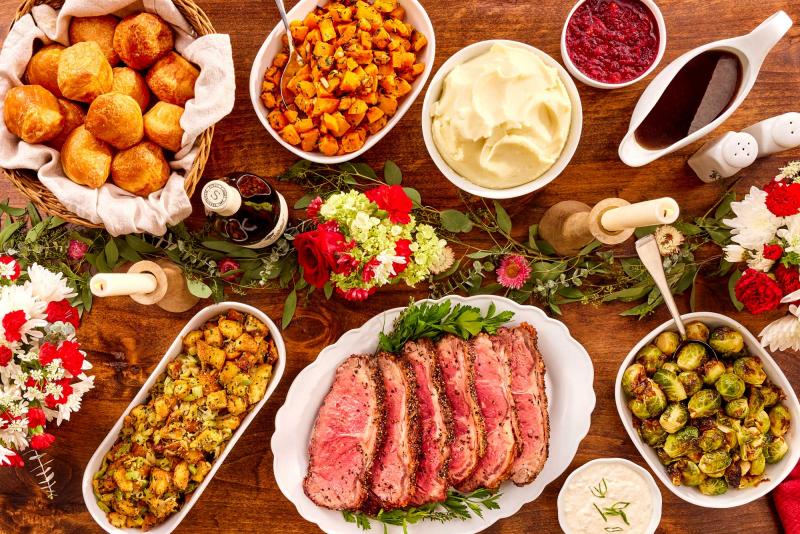 Holiday contemporary meal with New York roast portioned for 4-6 on a styled table setting