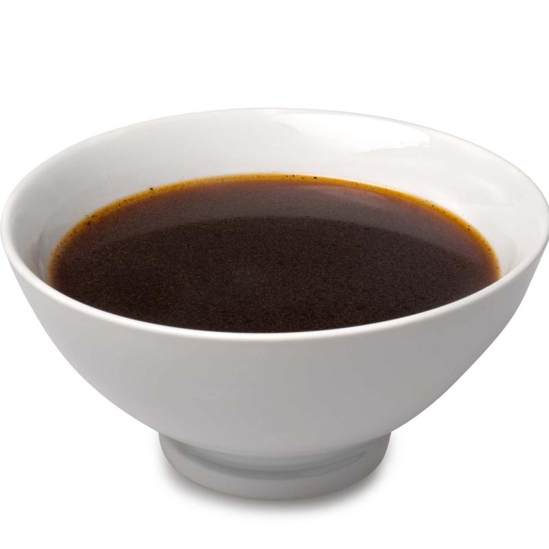 Beef jus in a serving bowl