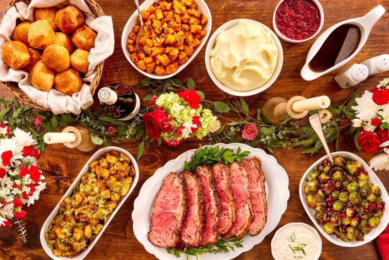 Holiday contemporary meal with New York roast portioned for 4-6 on a styled table setting
